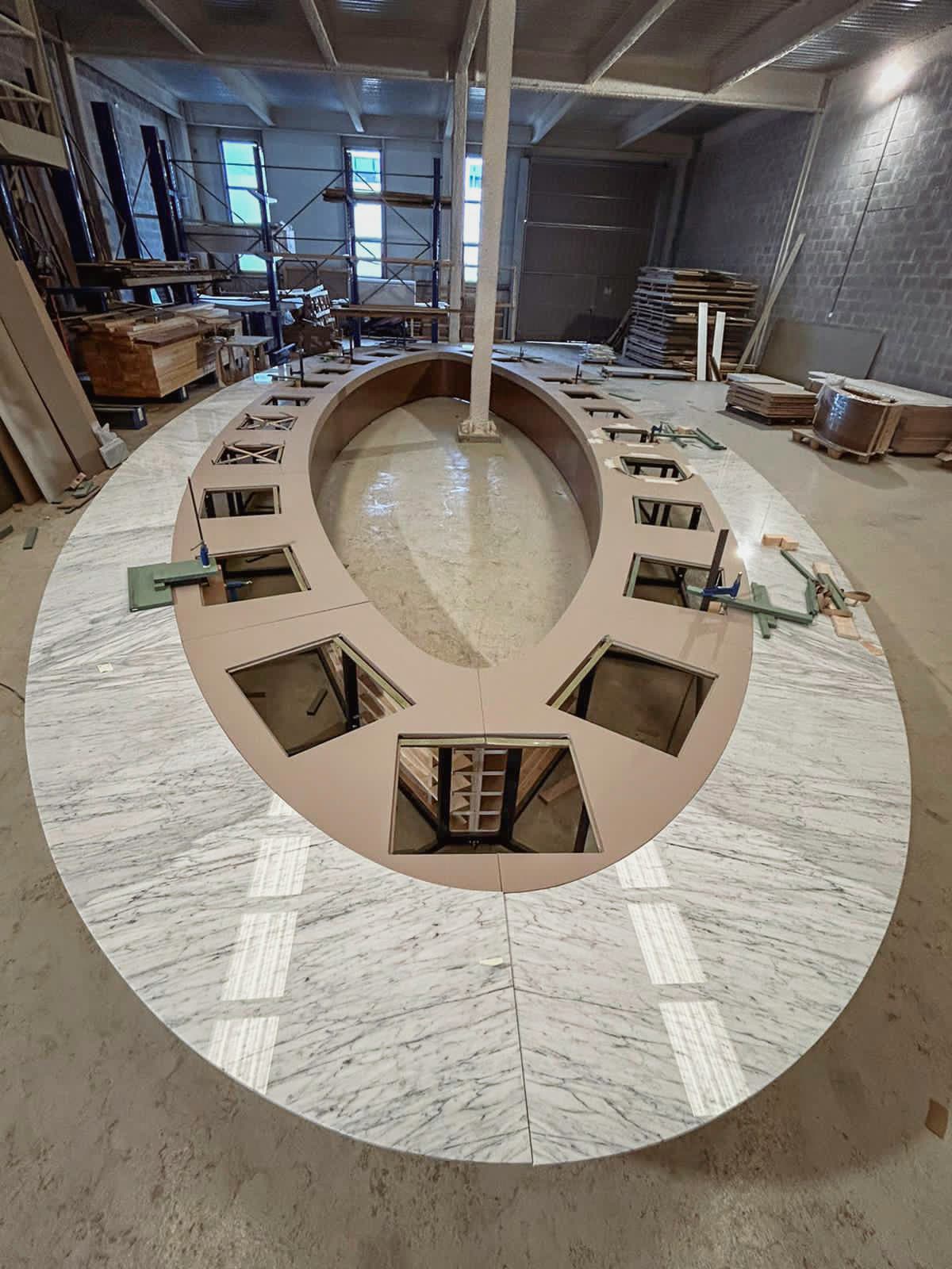 Large oval marble conference table handcrafted in the KZ Bespoke factroy in Spain